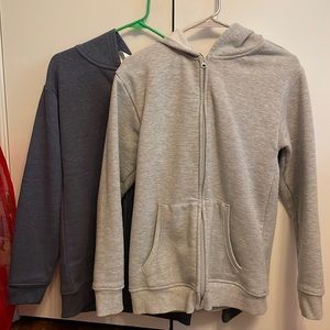 bundle of zip up hoodies